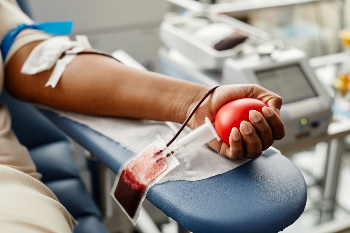 Closeup,Of,Black,Woman,Donating,Blood,Focus,On,Hand,Holding