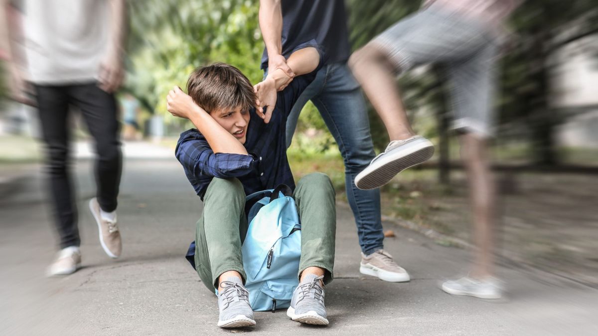 Aggressive,Teenagers,Bullying,Boy,Outdoors,,View,With,Motion,Blur,Effect
