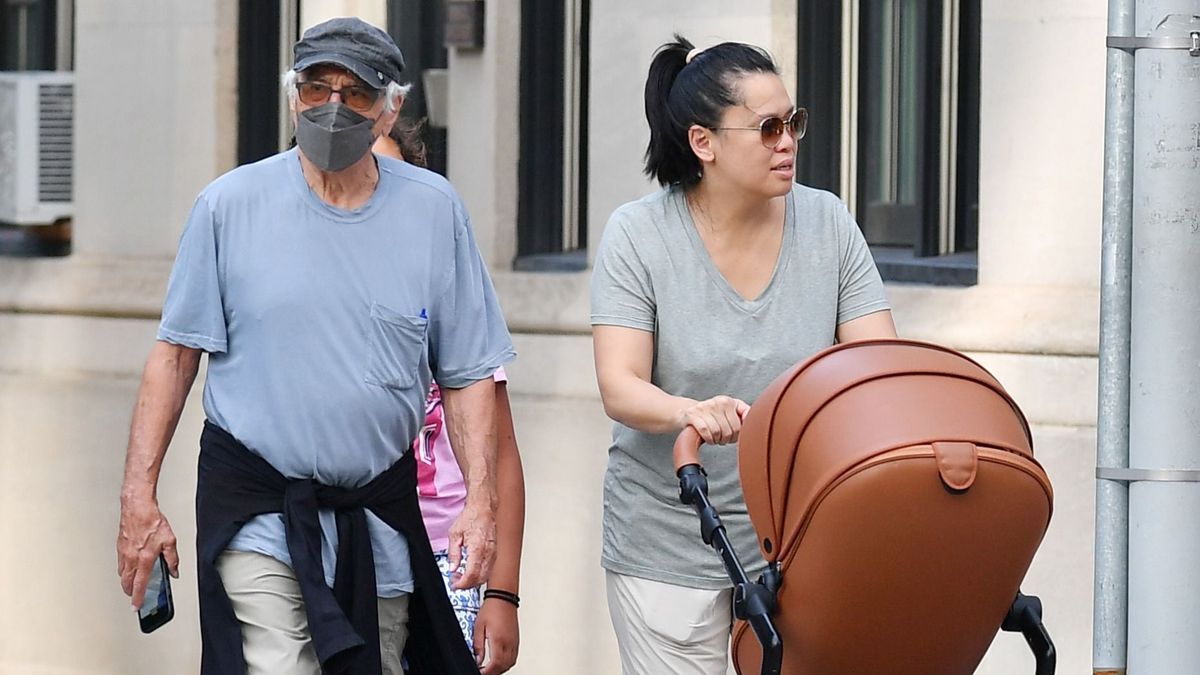 EXCLUSIVE: Robert De Niro and Girlfriend Tiffany Chen are Spotted for The First Time Together With Their New Addition in a Pram While on a Family Stroll in New York City.