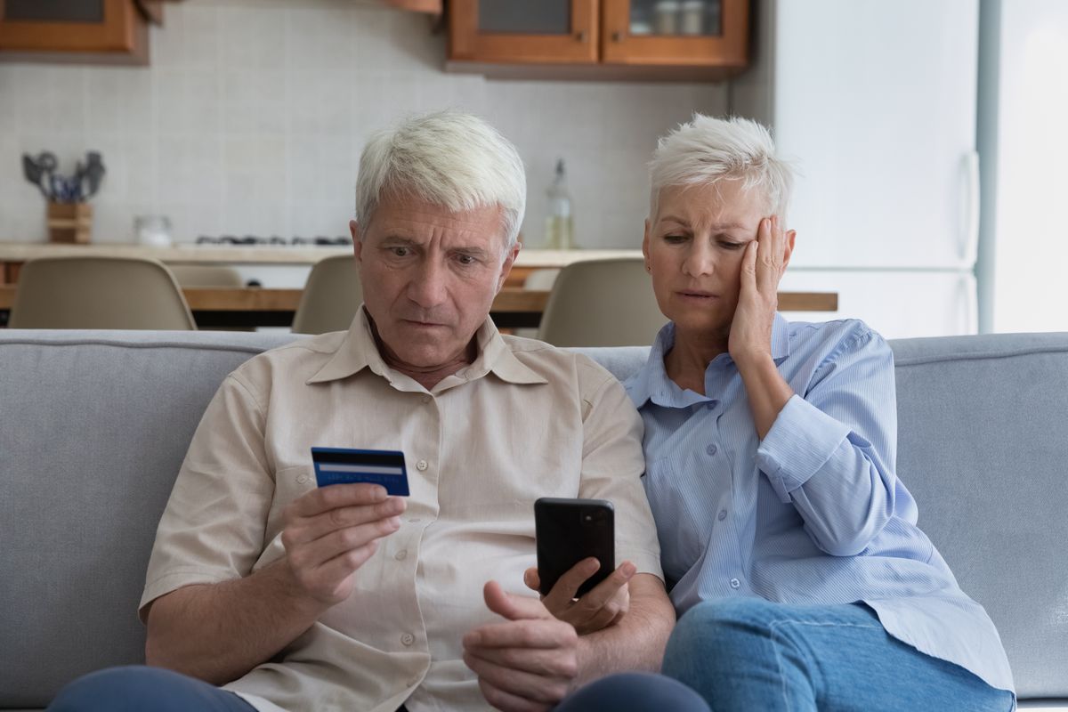 Shocked,Aged,Couple,Become,Victims,Of,Online,Fraud,Using,Credit