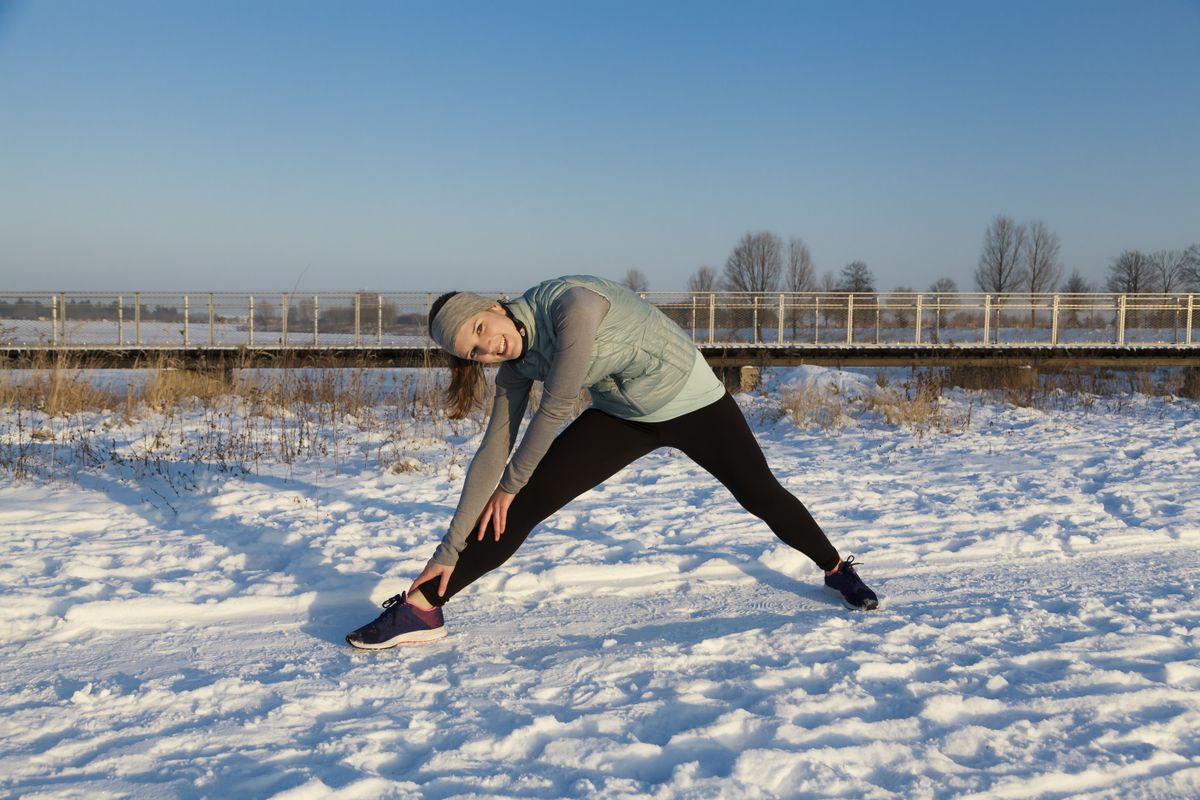 Female,In,Winter,After,Jogging,In,Snow,With,Blue,Sky,