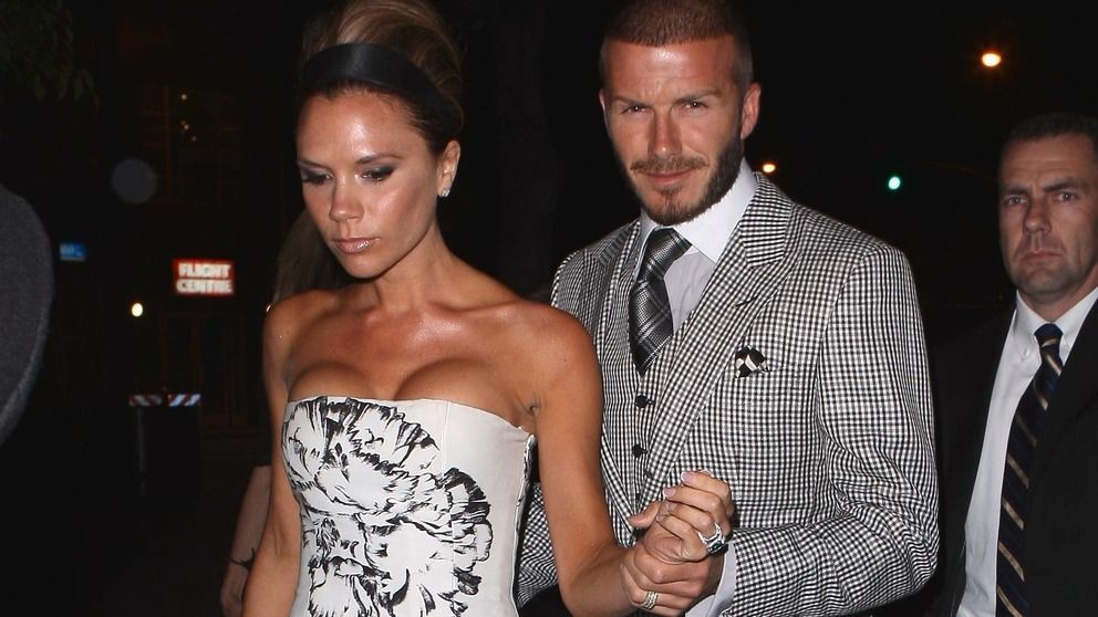 David and Victoria Beckham at party