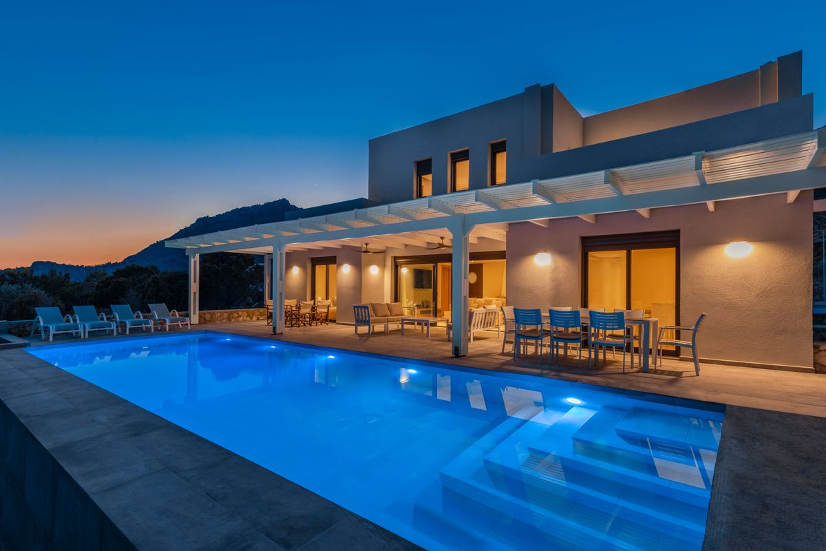 Beautiful,Greek,Villa,With,Swimming,Pool,At,Night.,Rhodes,Greece