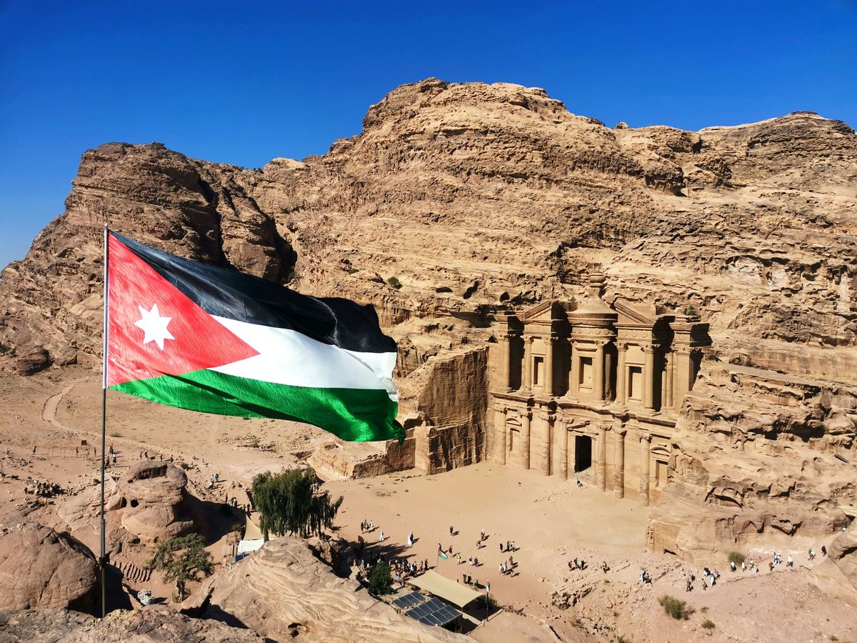 Monastery,In,Petra,,Jordan,,With,A,Jordanian,Flag