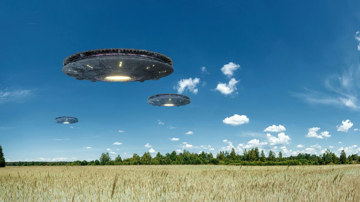 Ufo,,An,Alien,Plate,Hovering,Over,The,Field,,Hovering,Motionless