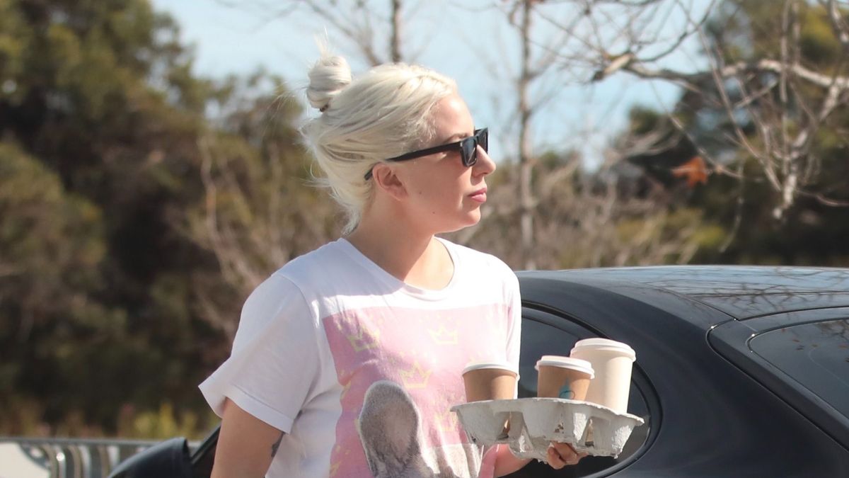 *EXCLUSIVE* Lady Gaga adds an espresso-powered boost to her day, zipping through the city streets in her sleek $120K Tesla Cybertruck