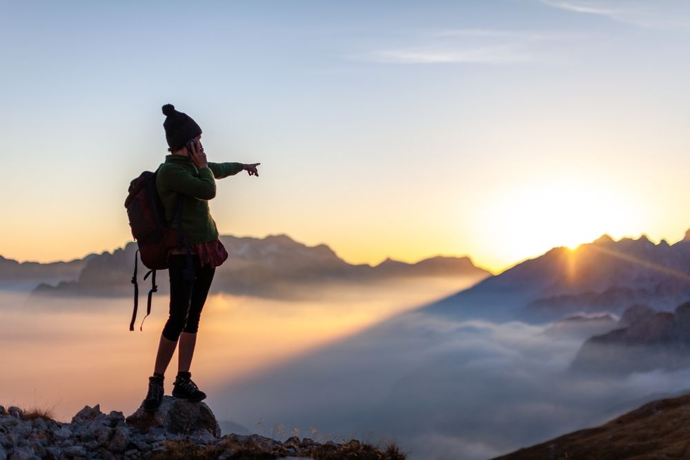 Woman,Hiker,Asking,For,Direction,Navigation,Tips,Trough,Her,Smart