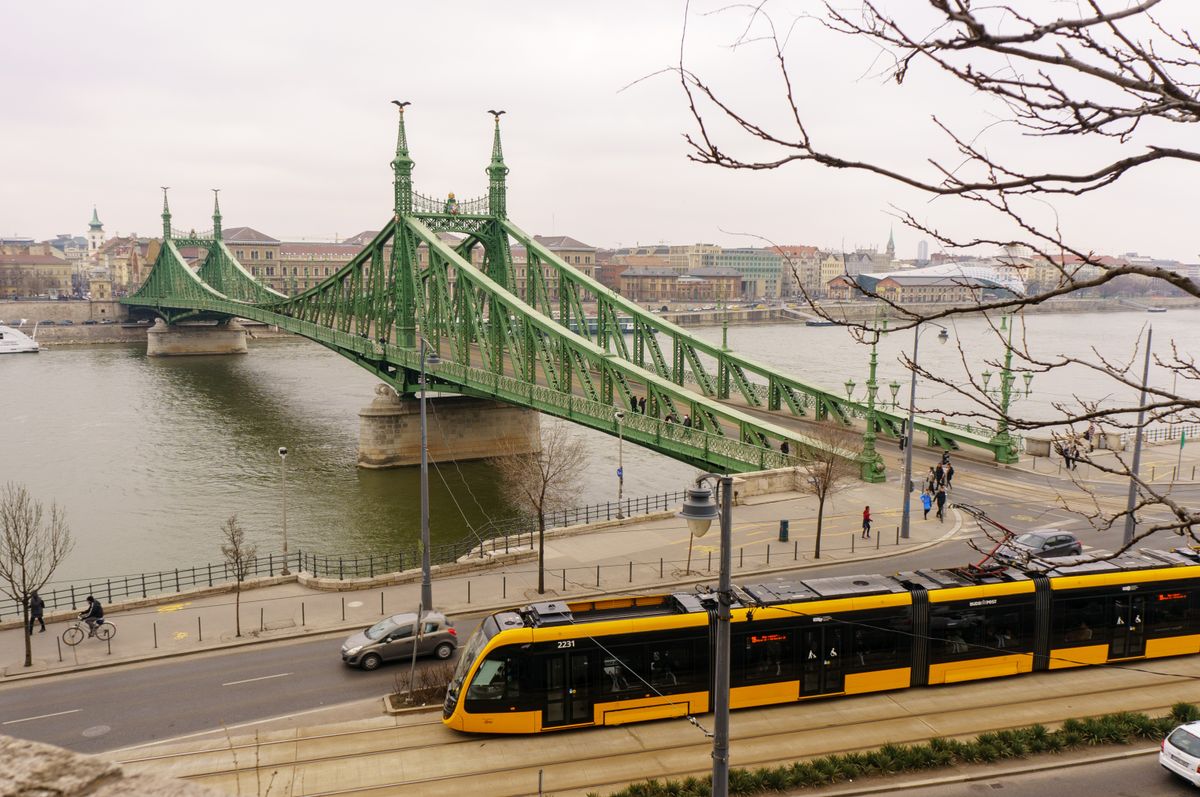 Budapest, Hungary - 24 March, 2018: The Freedom Bridge (Szabadság híd) is on the Danube connecting Buda and Pest. Exceptionally open to pedestrians and stationary to the traffic of cars