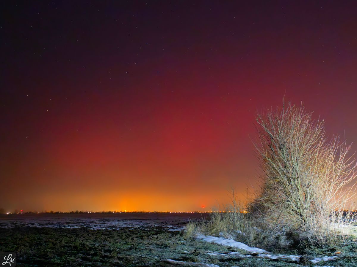 A sarki fény egy fotós lencséjén keresztül.